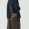 Kate Sheridan Leather Half Orbed Tab Bag
